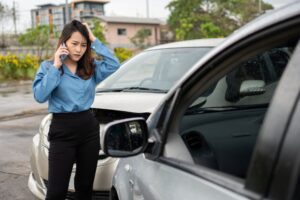 Car accident, woman on the phone